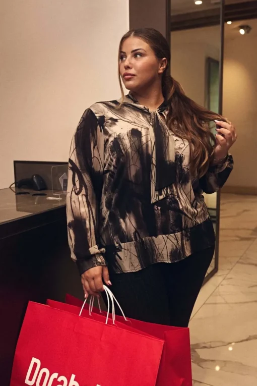 Blusa a fantasia con collo a fusciacca FANTASIA