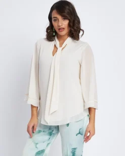 Blusa con scollo a V, fusciacca e manica a volant CREMA