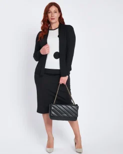 Maglia girocollo con pois e inserti a contrasto BIANCO