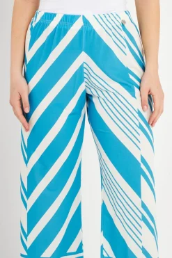 PANTALONE FANTASIA GEOMETRICA TURCHESE-CREMA