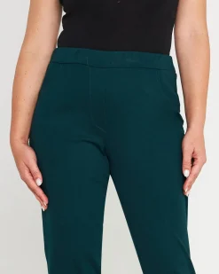 Pantaloni slim fit con vita elastica e dettaglio frontale di piega di