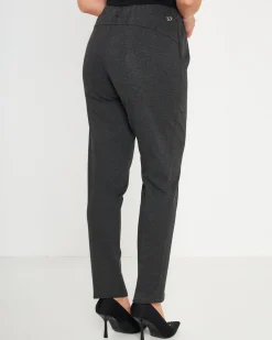 Pantaloni slim fit con vita elastica e dettaglio frontale di piega di